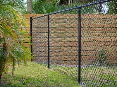 This image shows a tall black chain link fence.